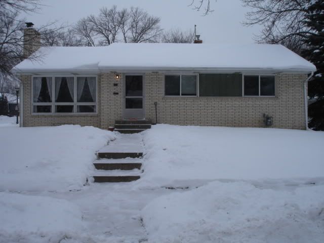 Front of house in winter.